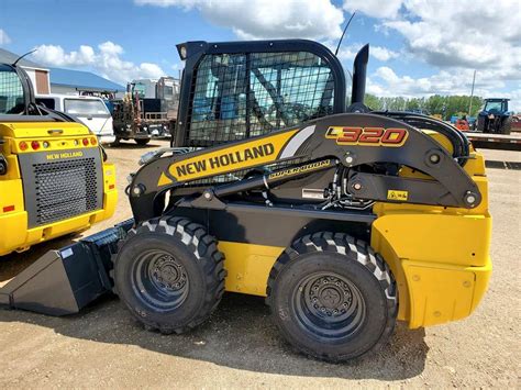 used new holland skid steer|new holland 320 skidsteer.